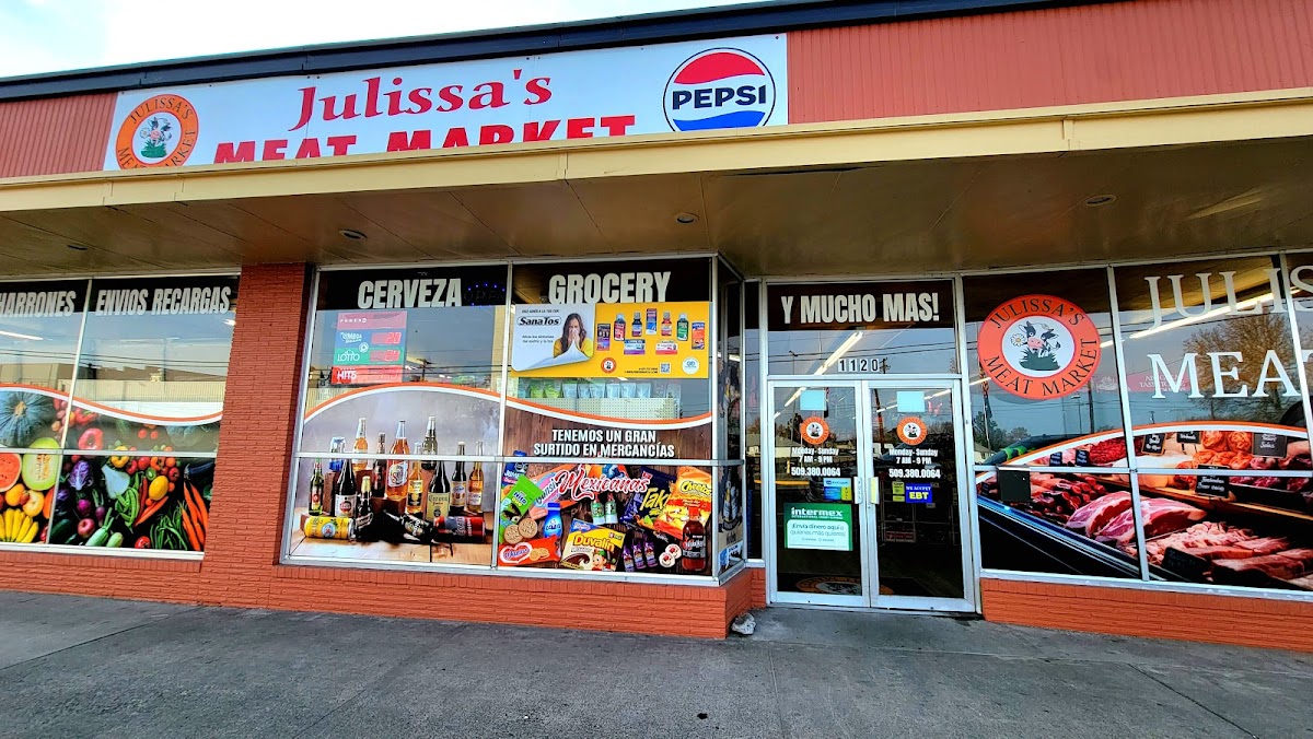 Julissa's Meat Market storefront with Spanish signage: Cerveza, Grocery, Y Mucho Más
